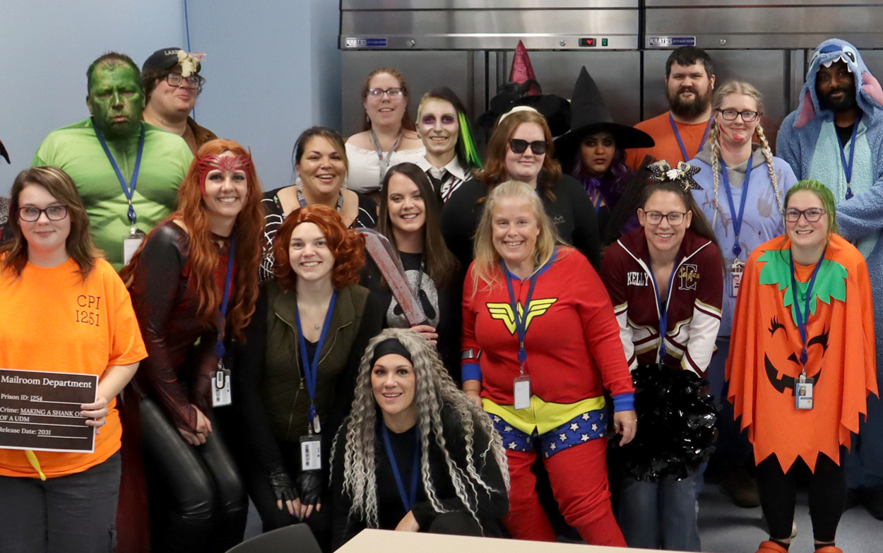 Employees dressed up as superheroes